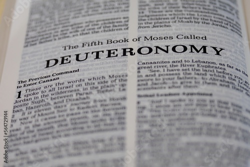 Deuteronomy, the fifth book of Moses from the bible, title page image with bokeh, Old Testament or Torah for Christian and Jewish religion