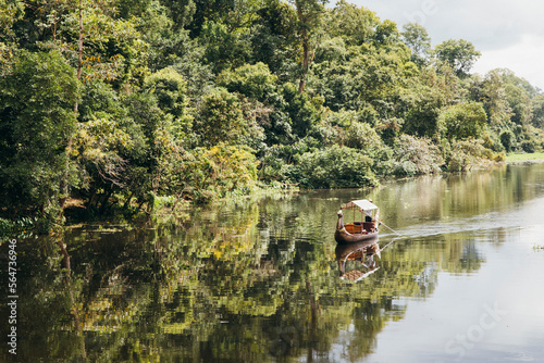 Ancient Cambodian boat on the river, Siem Reap