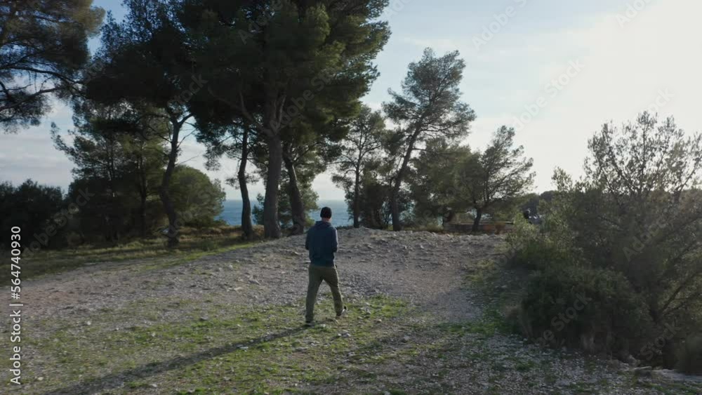 Man hiking in the nature near Cassis in the south of France Man hiking in the nature near Cassis in the south of France