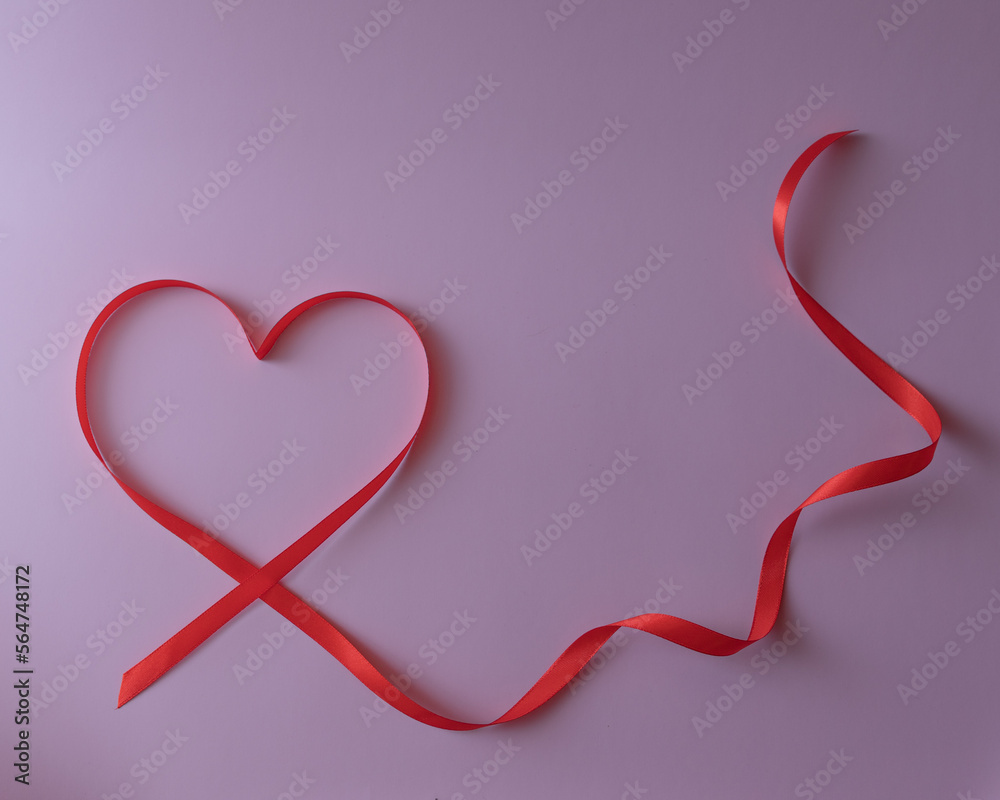 Valentine's Day, red ribbon in the form of a heart on a pink background, gift card