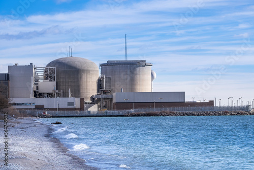 Pickering Nuclear Generating Plant, as seen from the shore of Lake Ontario, is located in  Pickering a city just outside of Toronto Canada.