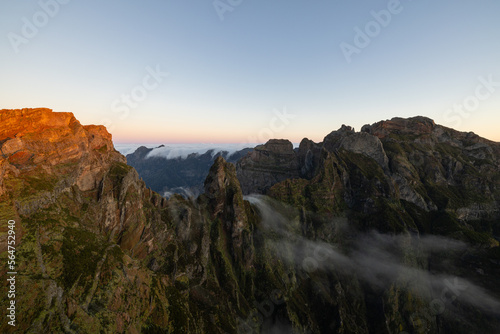Great sunrise on the Pico do Arieiro in Madeira with epic fog wrapping around the Ninho da Manta.
