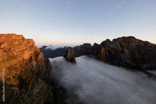 Epic sunrise with a sea of ​​fog on Madeira with the beautiful dawn.