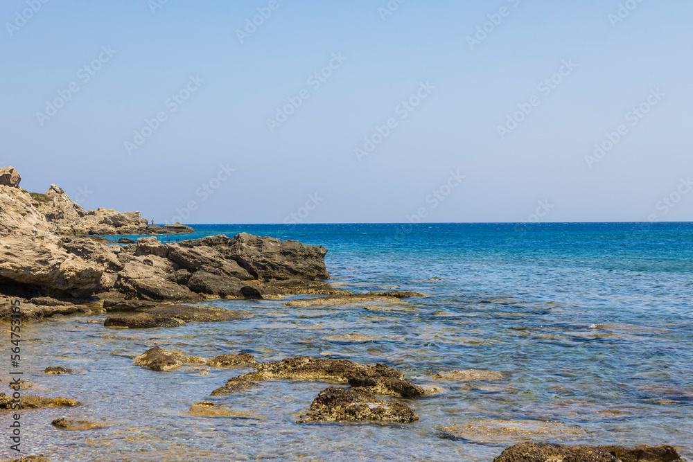 Beautiful view of rocks on coastline Mediterranean sea. Greece.