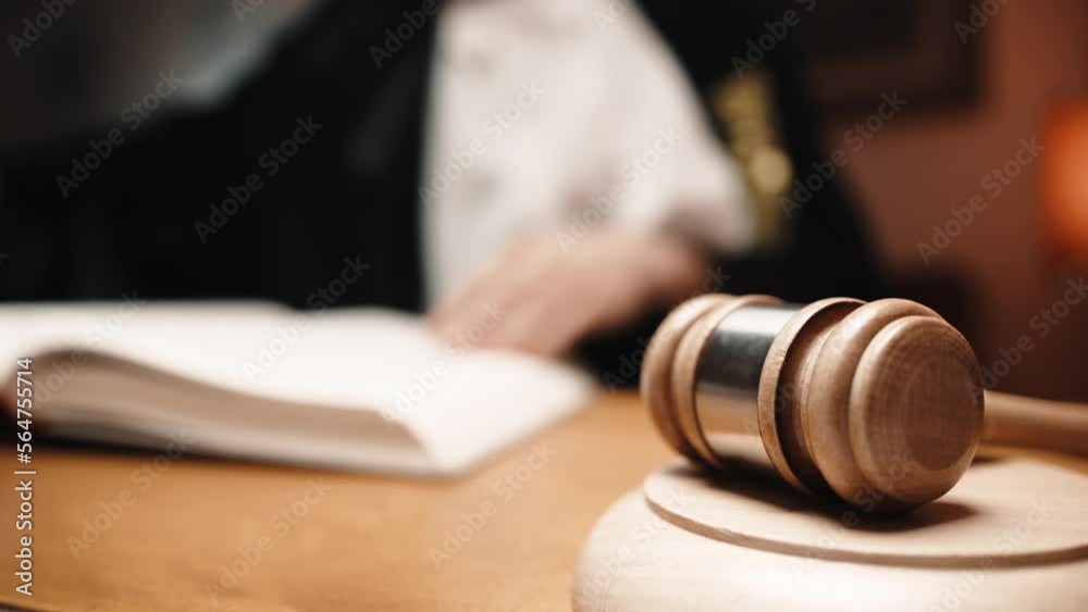 Judge In A Courtroom with hammer Judge In A Courtroom with hammer