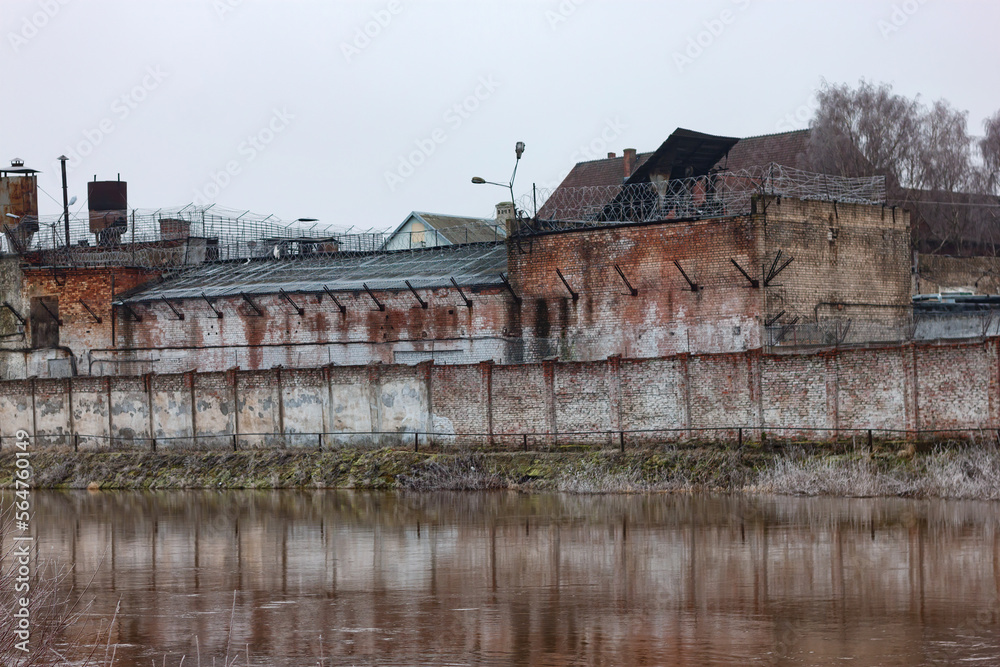 The walls and buildings of the prison (correctional colony) on the territory of the medieval Tapiau castle in Gvardeysk. Kaliningrad region. Russia
