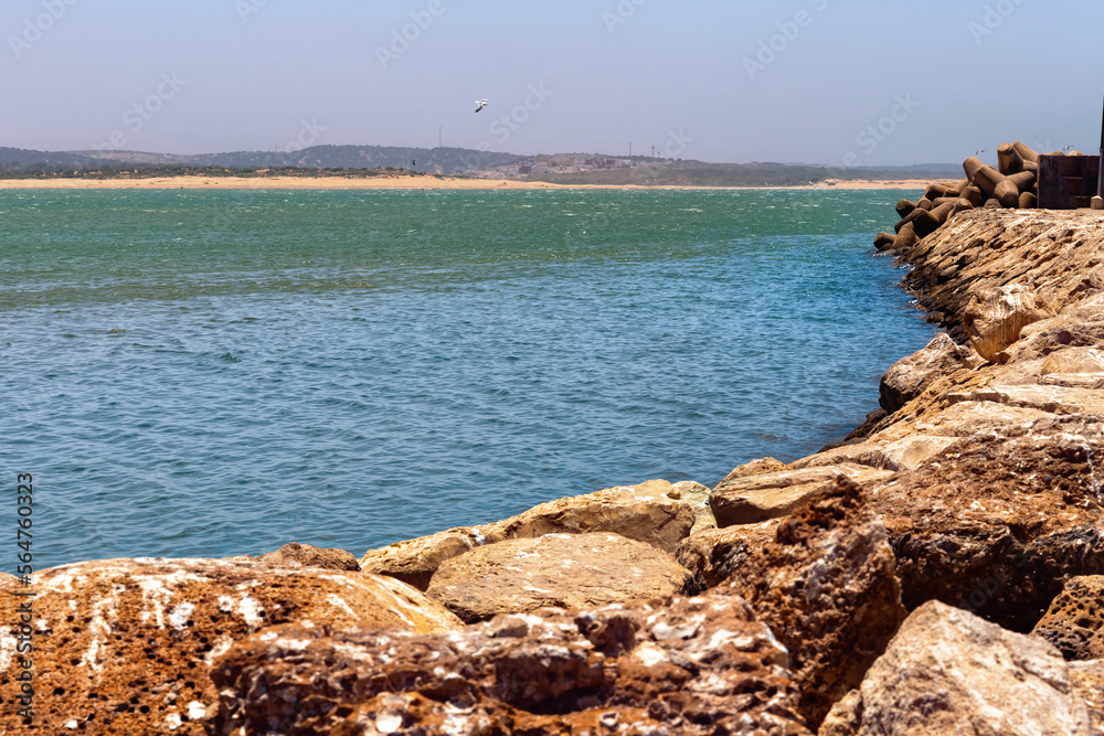 Volcanic coast of the Atlantic ocean in the Essaouira on a sunny summer day. Morocco.