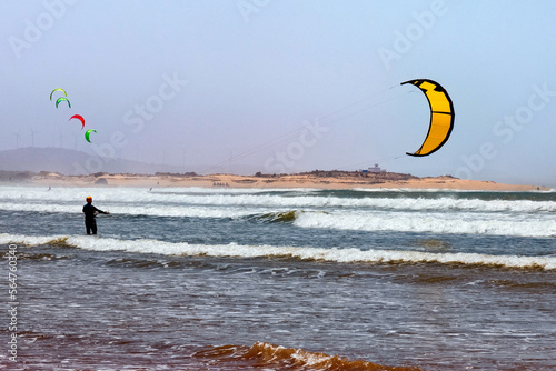 Kiteboarding activities on the Atlantic ocean waves in the Essaouira. Morocco.