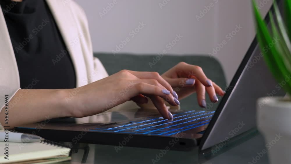 Closeup hands fingers of business woman working on laptop in her office. Female entrepreneur typing on computer. Small Business Startup Success Requires Hard Work and Dedication Focused Businesswoman Closeup hands fingers of business woman working on laptop in her office. Female entrepreneur typing on computer. Small Business Startup Success Requires Hard Work and Dedication Focused Businesswoman