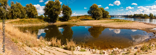 High resolution stitched panorama with reflections at the famous Bogenberg mountain, Bogen, Danube, Bavaria, Germany photo