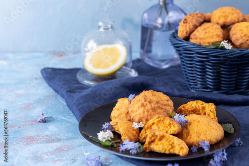 Carrot cookies for breakfast or snack on a blue background. Healthy vegan food. 