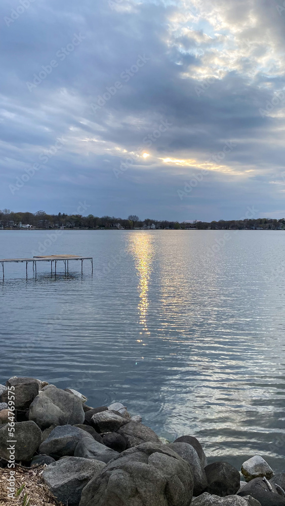 spring silver gray sunset over the lake with pier spring silver gray sunset over the lake with pier