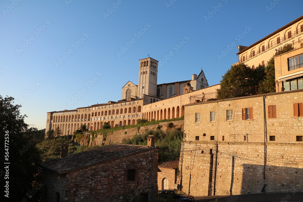 View to Basilica di San Francesco d'Assisi in Assisi at Sunset, Umbria Italy