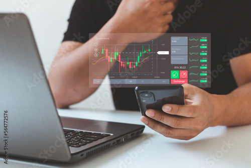 planning and strategy, Stock market, trader or investor working at home. Technical price graph and indicator, red and green candlestick chart and stock trading mobile smartphone on virtual screen.