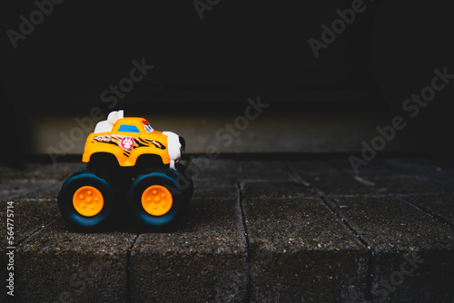 Yellow Toy Truck on a Road Miniature Photography © Sidrah
