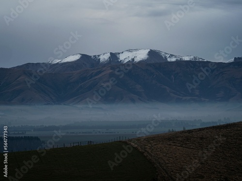 Snow capped mountain range panorama along Highway 79 between Fairline and Geraldine Timaru Canterbury New Zealand photo