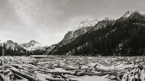 Driftwood stacks below a mountain at the Enchantment Lakes photo