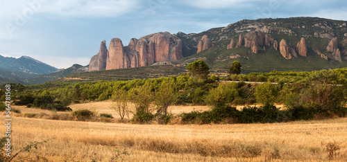 Scenic landscape with rock formations, Mallos de Riglos, Aragon, Spain photo