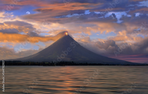 Mayon volcano near Legazpi City - eruption at sunset photo