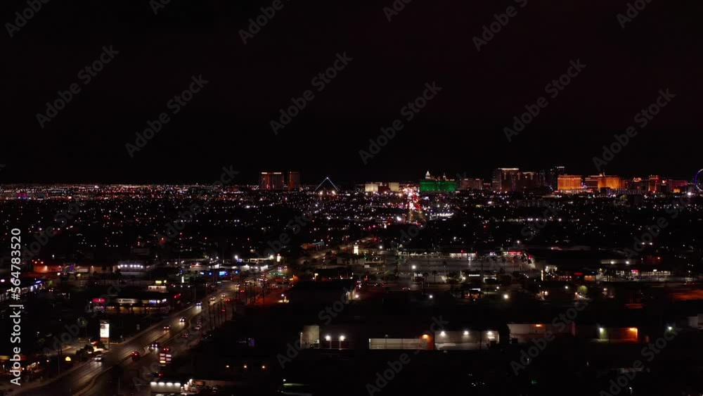 Super wide aerial descending dolly shot of the south side of the Las Vegas Strip at night. 4K Super wide aerial descending dolly shot of the south side of the Las Vegas Strip at night. 4K
