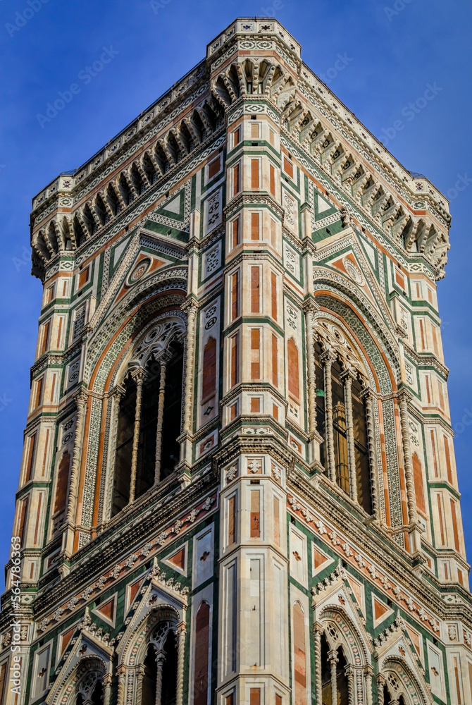 Marble facade of Giotto Campanile bell tower at the Duomo in Florence, Italy.