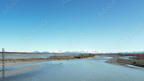 Wallpaper Mural Flying low downstream above beautiful Rakaia River (New Zealand) on a calm, cold mid-winter's morning - vast landscape, big sky and stunning mountains. Torontodigital.ca