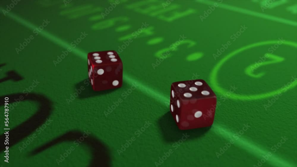 Pair of dice thrown onto a craps or crapaud table with glittering poker machines in a casino background - craps throws - translucent red dice throw of five and six - eleven Pair of dice thrown onto a craps or crapaud table with glittering poker machines in a casino background - craps throws - translucent red dice throw of five and six - eleven