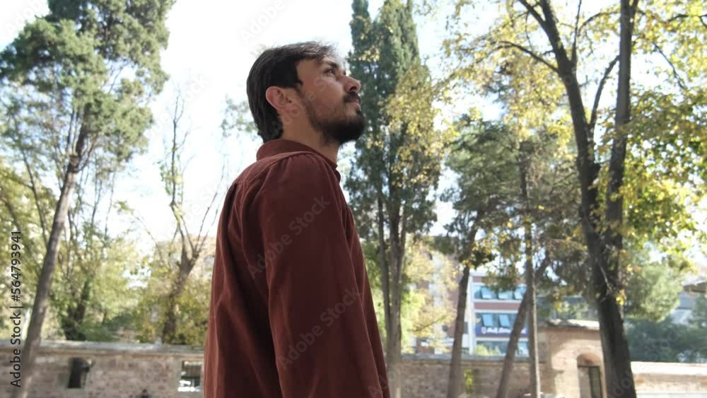 Man Standing In Mosque Garden Man Standing In Mosque Garden