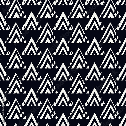Paint brush triangles ornament. Seamless pattern. Hand drawn geometrical backdrop. Triangular shapes wallpaper. Geometric background. Ethnic motif. Tribal digital paper. Textile print. Chevrons vector