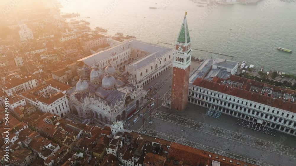 San Marco Square (Piazza San Marco) At Sunrise In Venice, Italy - aerial drone shot