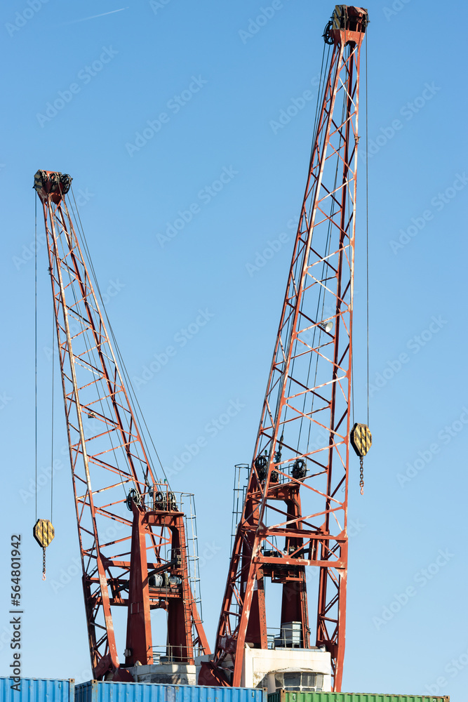 Cranes in the seaport for lifting cargo Cranes in the seaport for lifting cargo