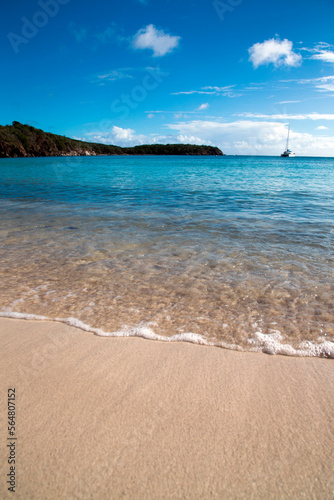 Surf rolls onto pristine beach at Little Lameshur Bay, St. John, US Virgin Islands photo