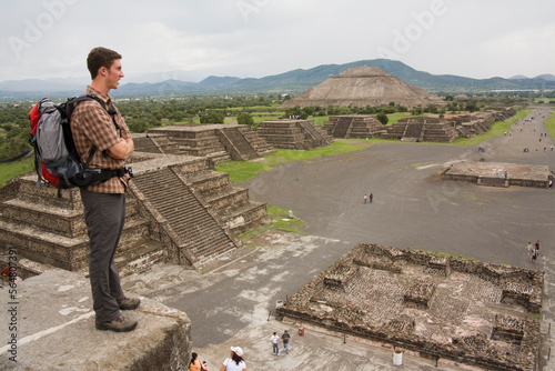 A tourist enjoys the view from the Pyramid of the Moon at the archeological site of Teotihuacan, Mexico state, Mexico.