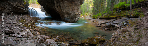Rushing water carves a path through the limestone of Johnston Canyon in Banff National Park, Alberta, Canada.