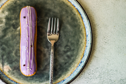 French dessert eclair with lavender photo
