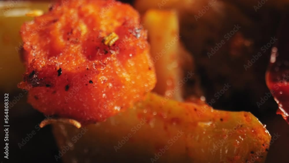 Cinematic close-up of grilled vegetables including juicy squash and tender carrots. Dolly in camera movement. Cinematic close-up of grilled vegetables including juicy squash and tender carrots. Dolly in camera movement.
