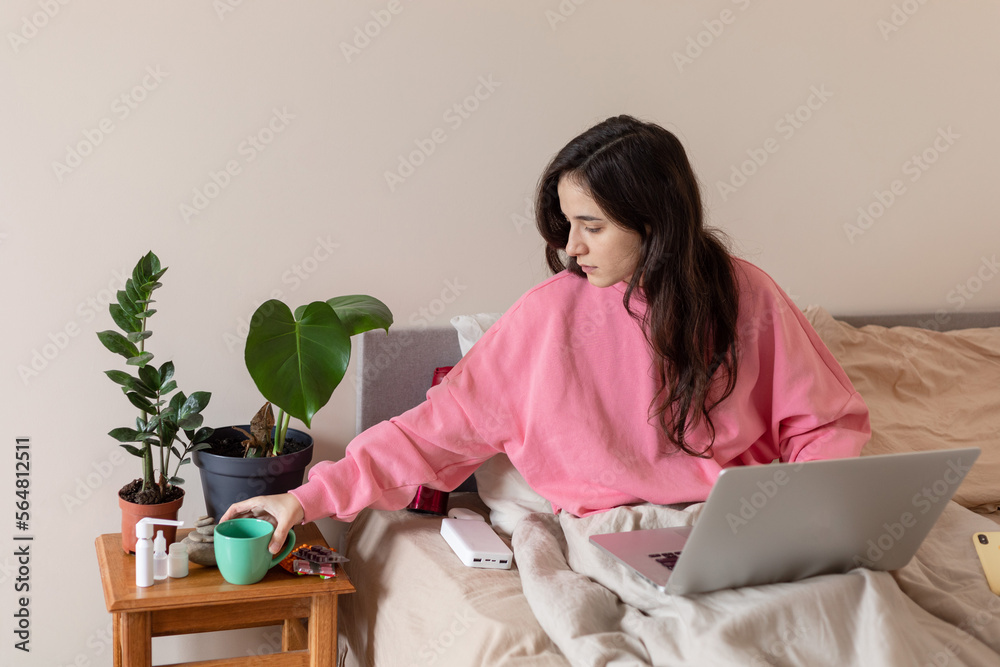girl takes tea from a chair girl takes tea from a chair