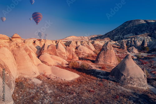 Goreme national park, color hot air balloons fly, Amazing sunrise Cappadocia. Turkey travel Romantic vacation concept