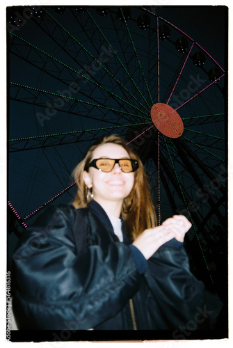 portrait of young woman in amusement park