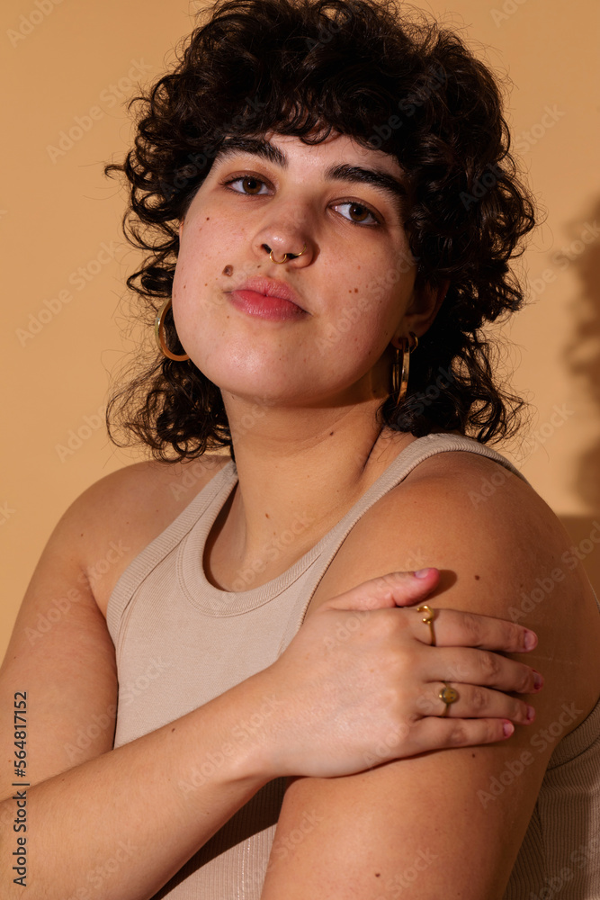 Short curly haired trans woman portrait Short curly haired trans woman portrait