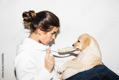 Woman reproaching her dog
