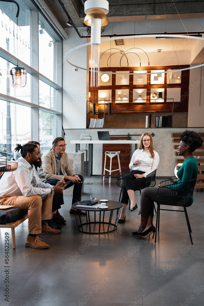 © Aleksandra Jankovic/Stocksy - Diverse Group Of People Doing A Job Interview