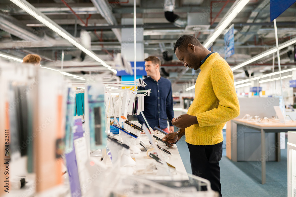 Clients In Electronics Store