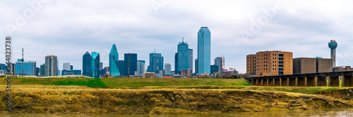 Dallas City downtown skyline, cityscape after rain in winter, a view from the Trinity River Skyline Trail near Reunion Tower in Texas, USA