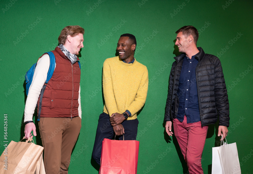 © Hernandez & Sorokina/Stocksy - Happy People With Shopping Bags