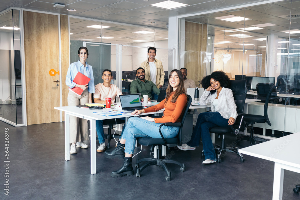 Happy Multiethnic Teamwork In A Coworking Space Happy Multiethnic Teamwork In A Coworking Space