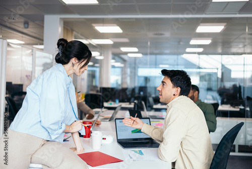 Workers of a company meeting in a coworking space