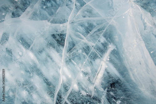 Ice pattern of the frozen lake photo