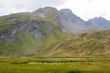 Alpine lake and mountain range