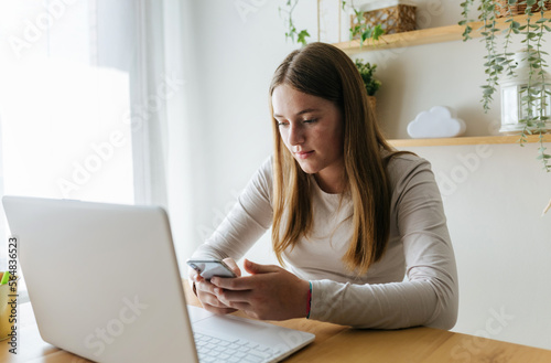 Woman using laptop photo